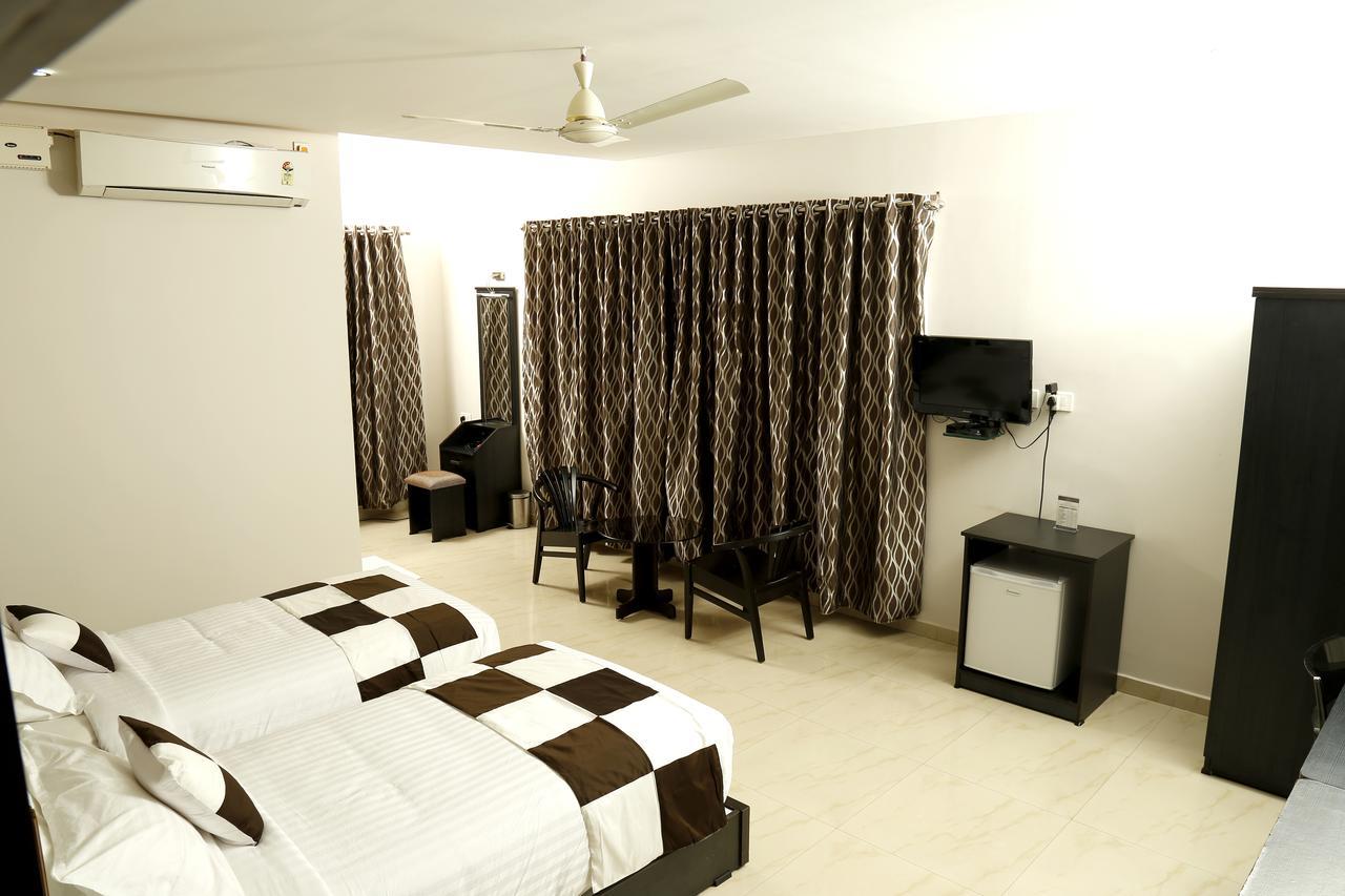 Rydges Inn Kottakkal Phòng bức ảnh